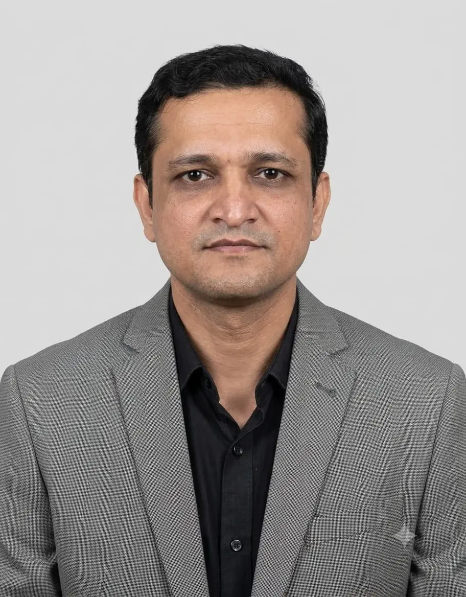 Dr. Dinesh M. Gami